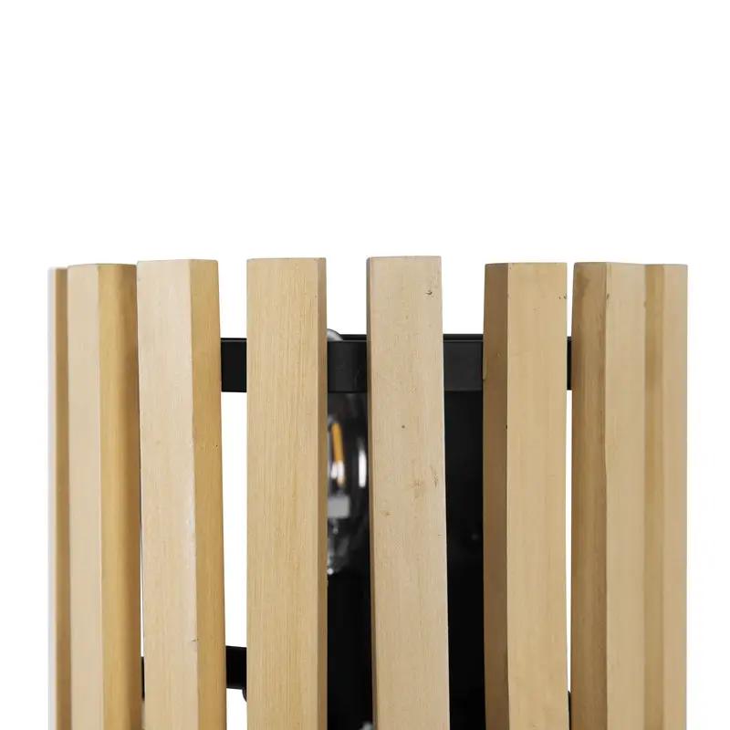 matte black/honey blonde wall mount light