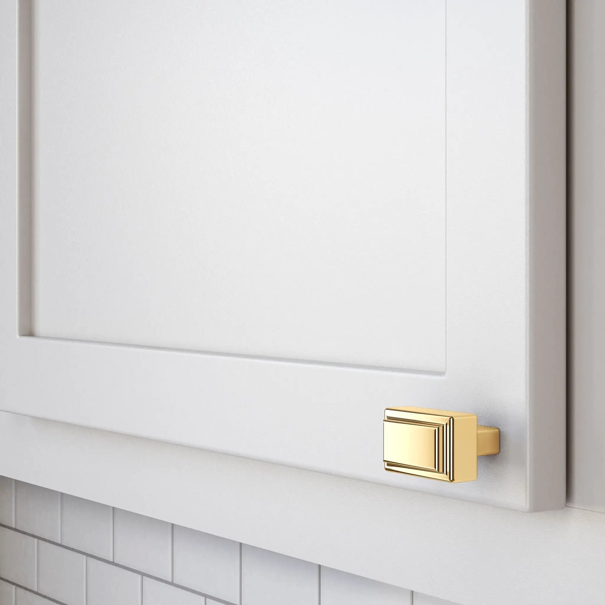 polished brass knob