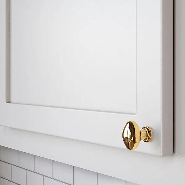 polished brass knob