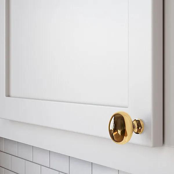 polished brass knob