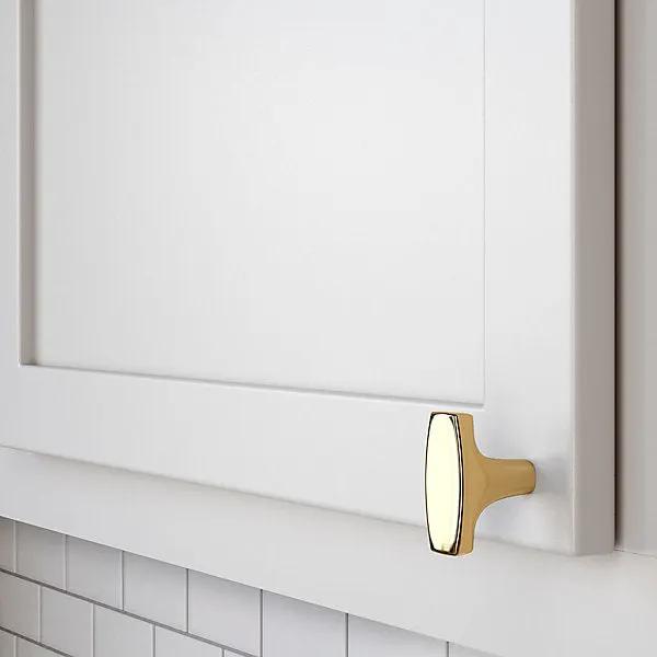 polished brass knob