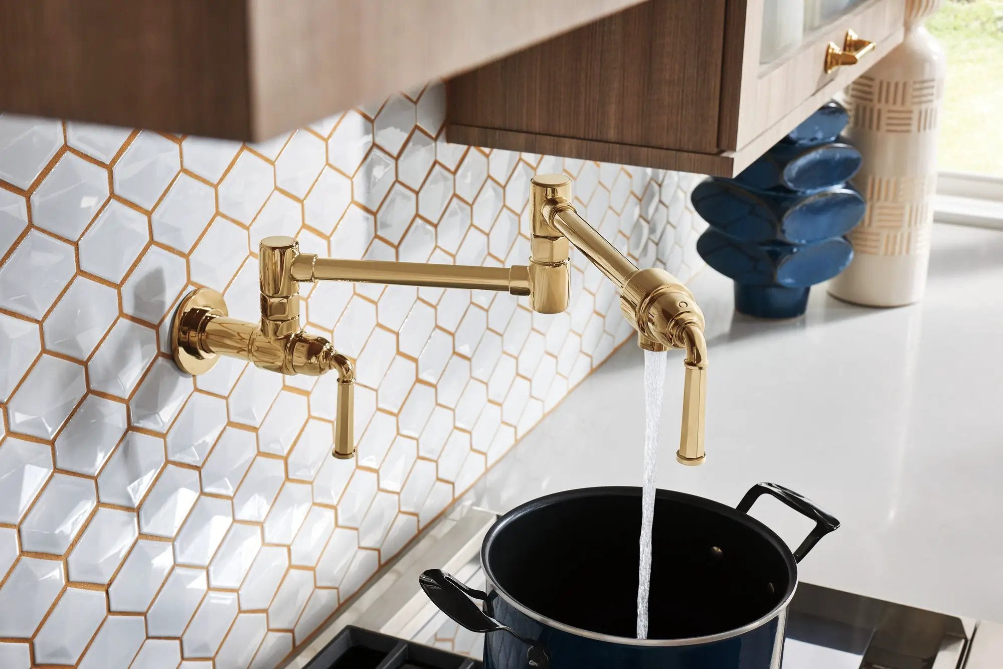 polished gold pot filler