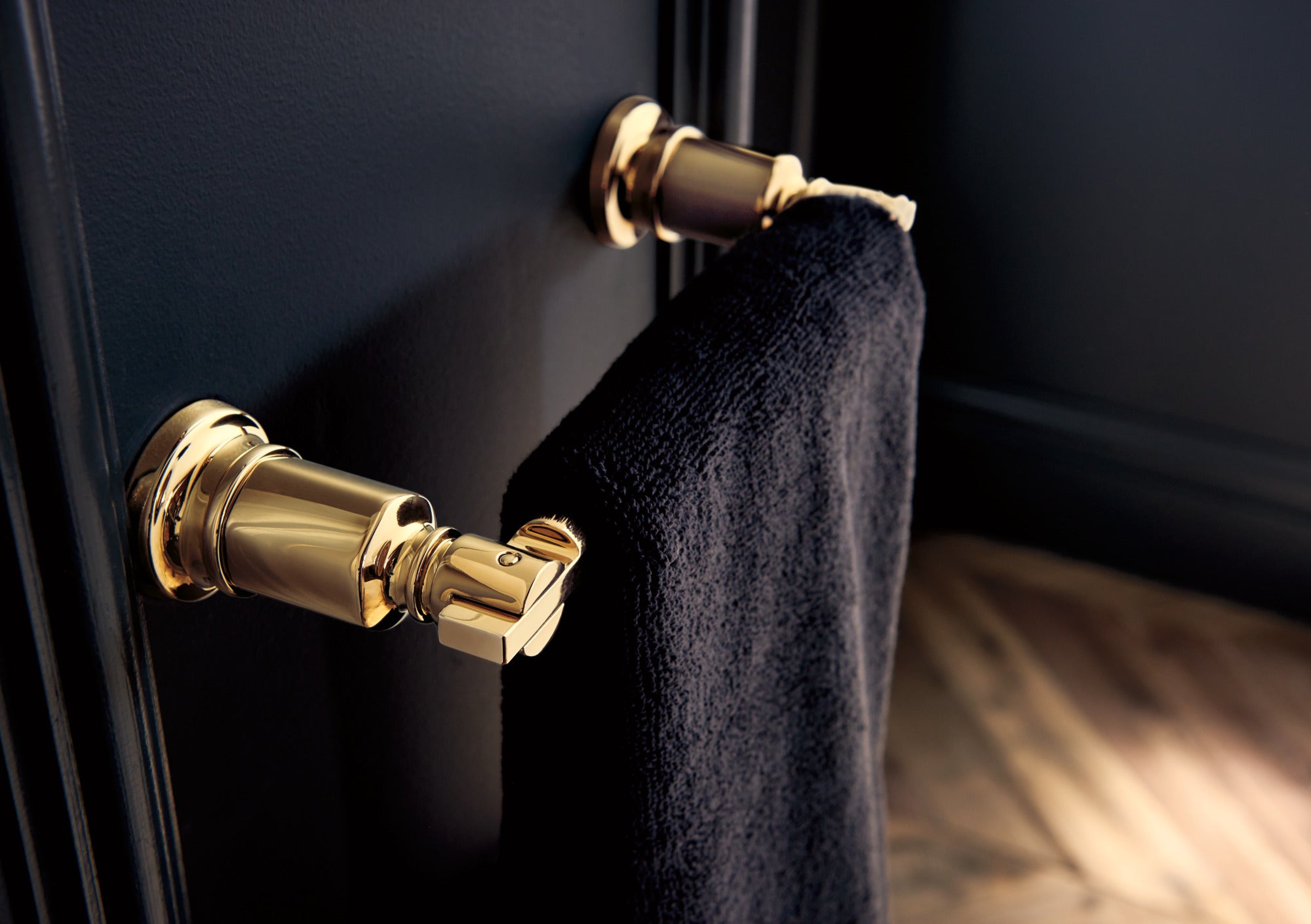 polished gold towel bar