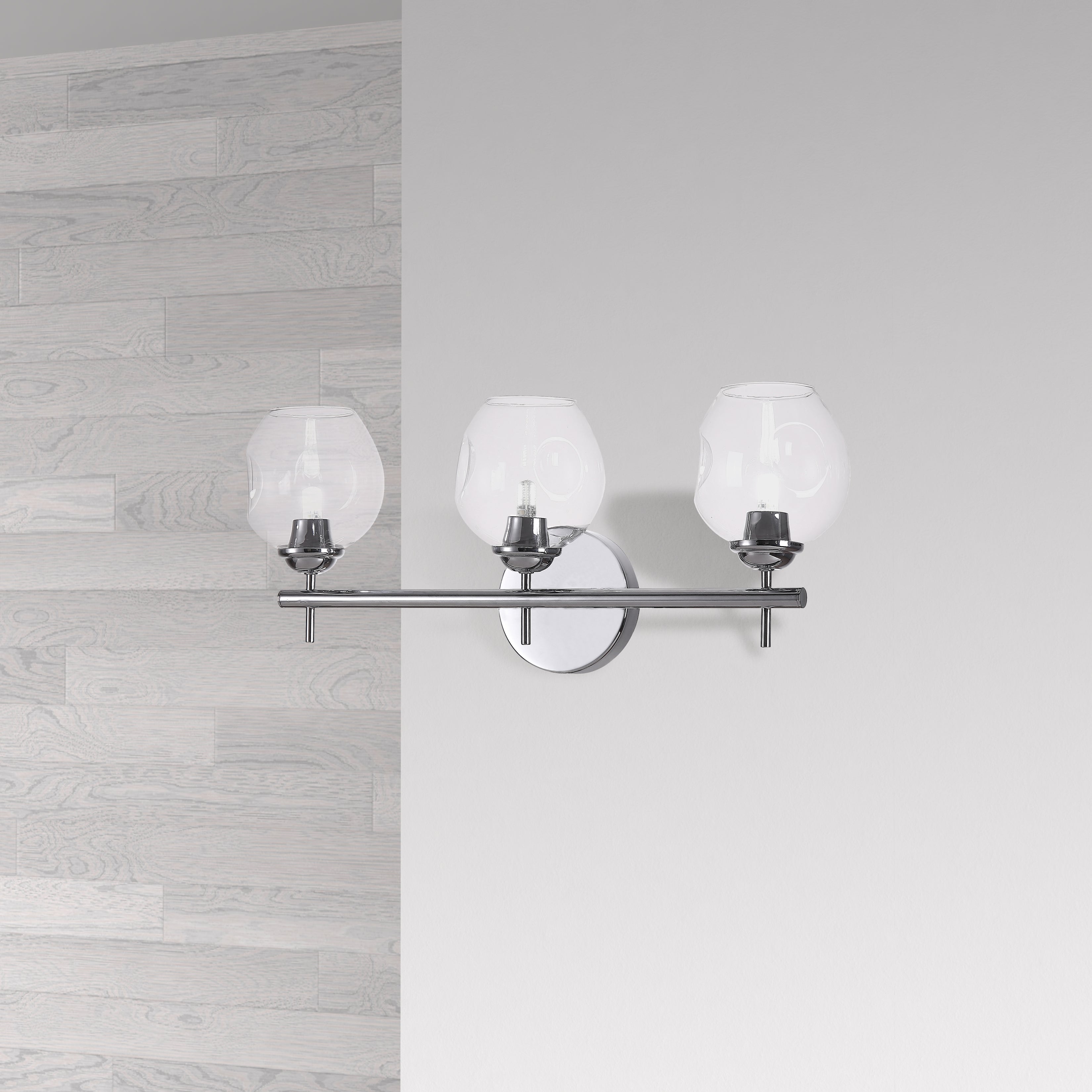 polished chrome with clear glass wall sconce