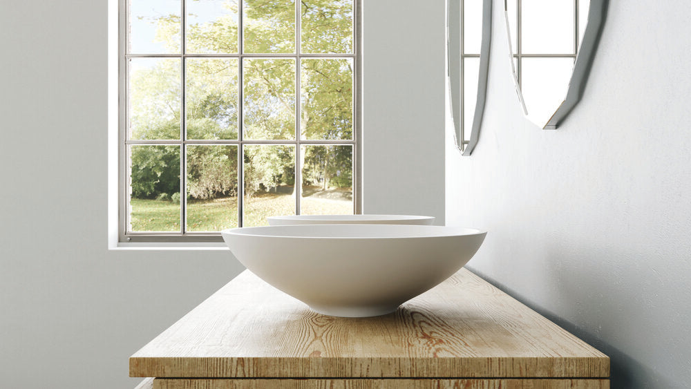 white vessel sink