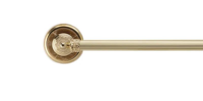 polished brass towel bar
