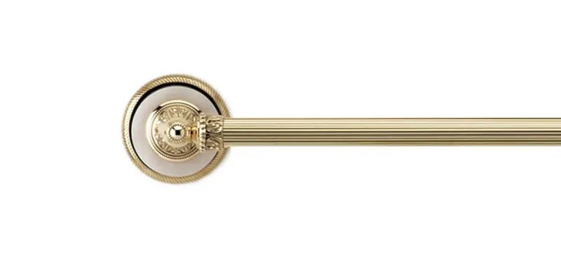 polished brass towel bar