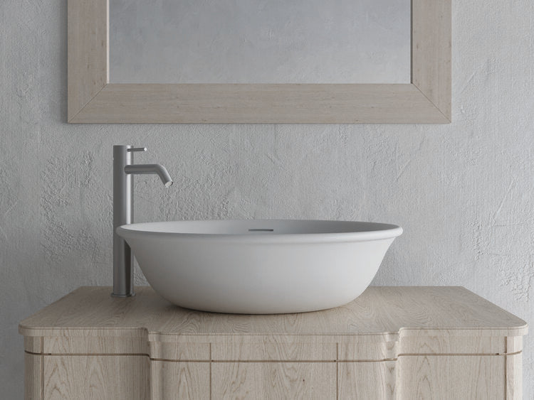 white vessel sink