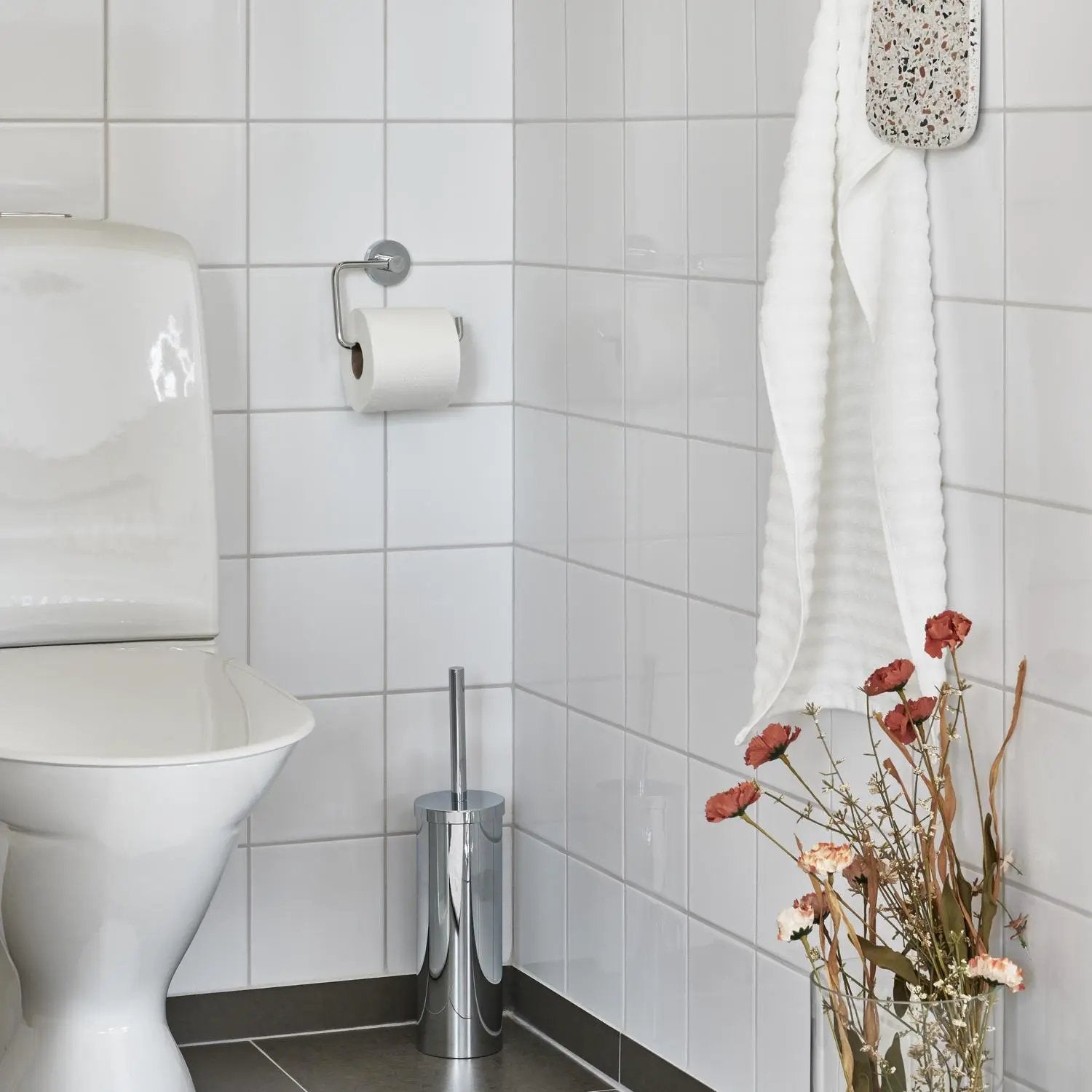 polished chrome toilet roll holder
