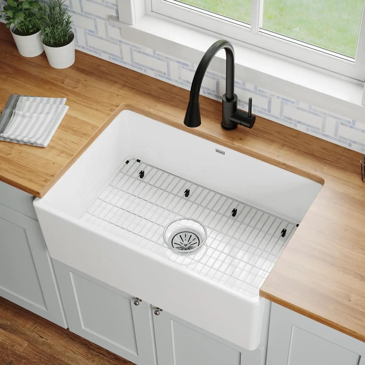 white farmhouse sink