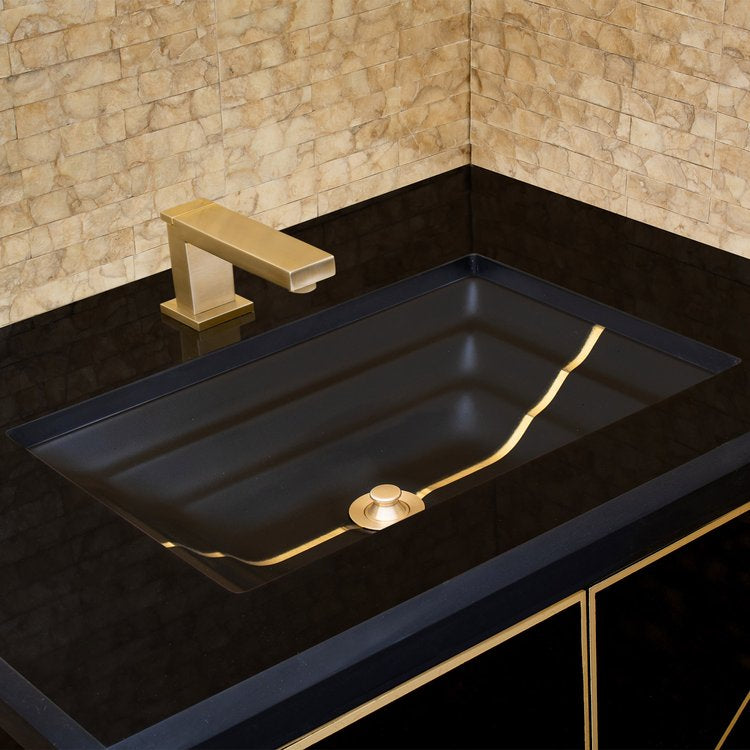 black glass with brass accent sink