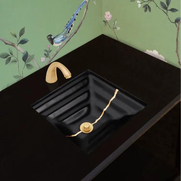 black glass with gold accent sink