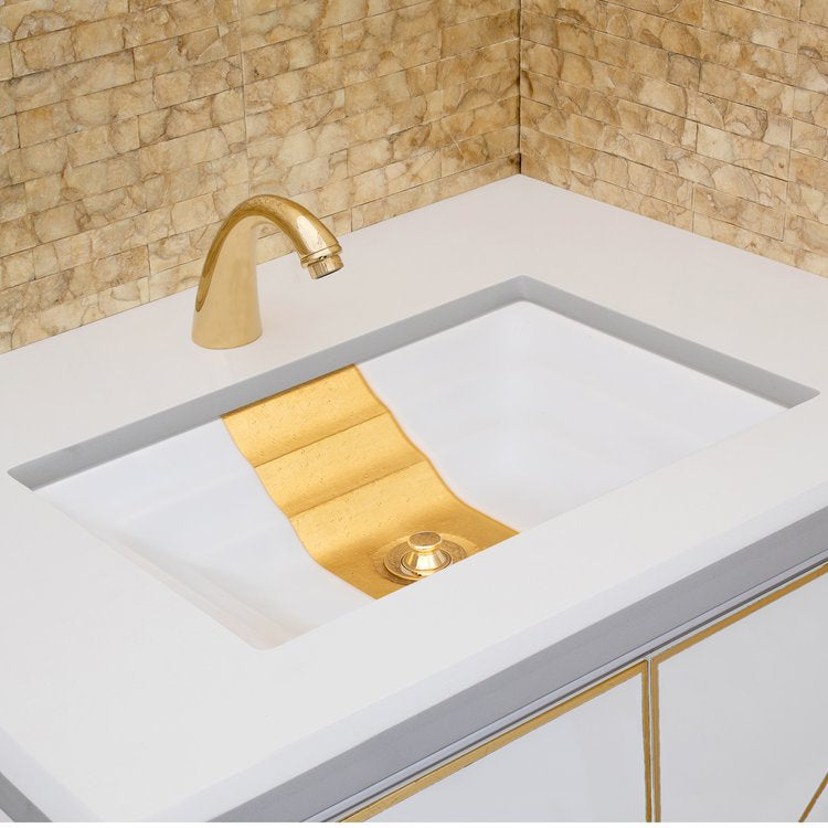 white glass with gold accent sink