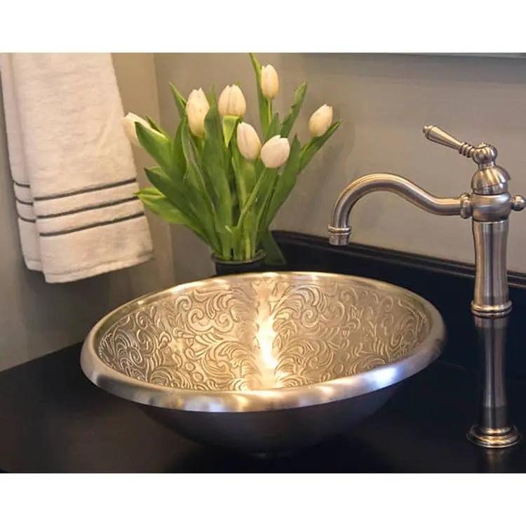 white bronze sink