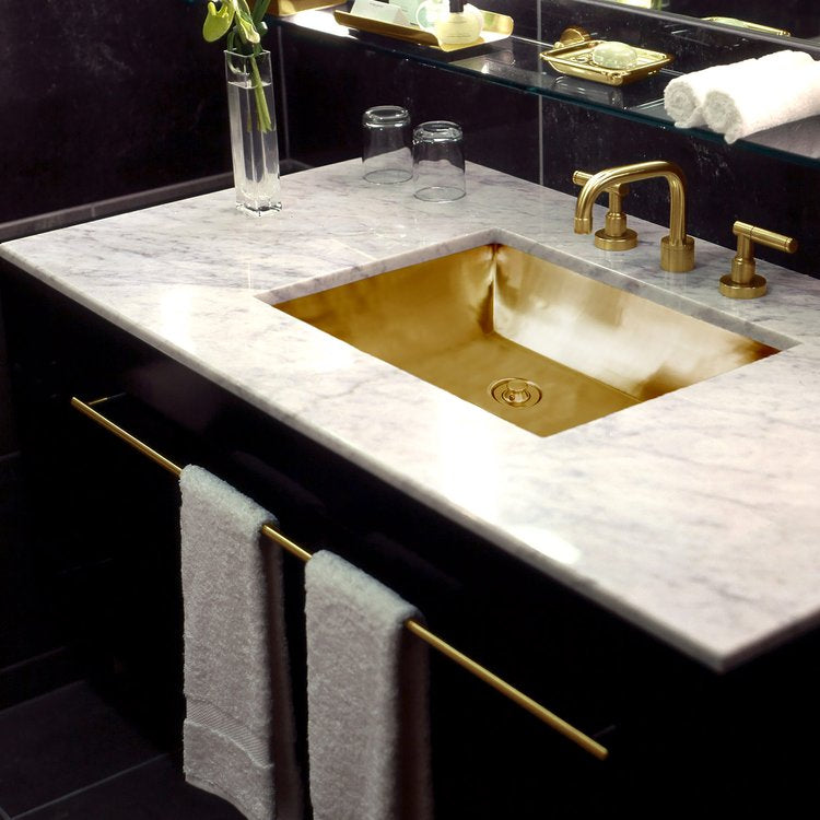 polished unlacquered brass sink