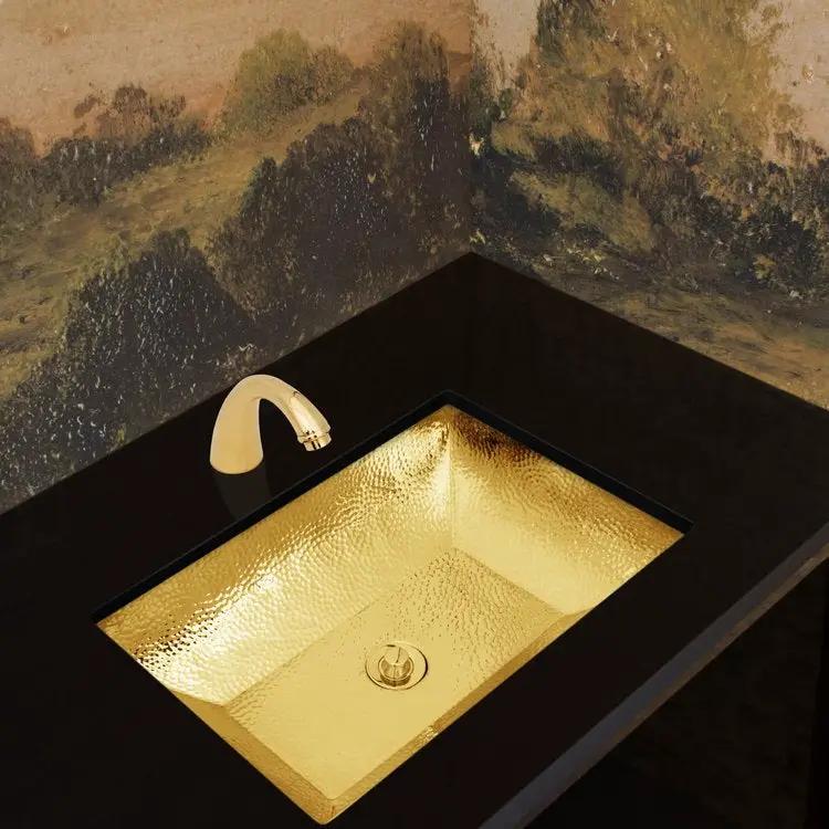 polished unlacquered brass sink