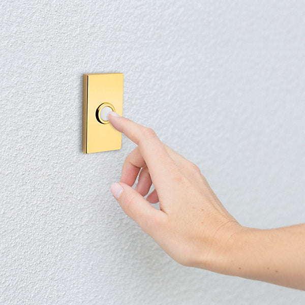 polished brass bell button