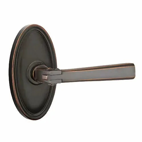 Emtek Arts and Crafts Door Lever with Oval Rose by Emtek