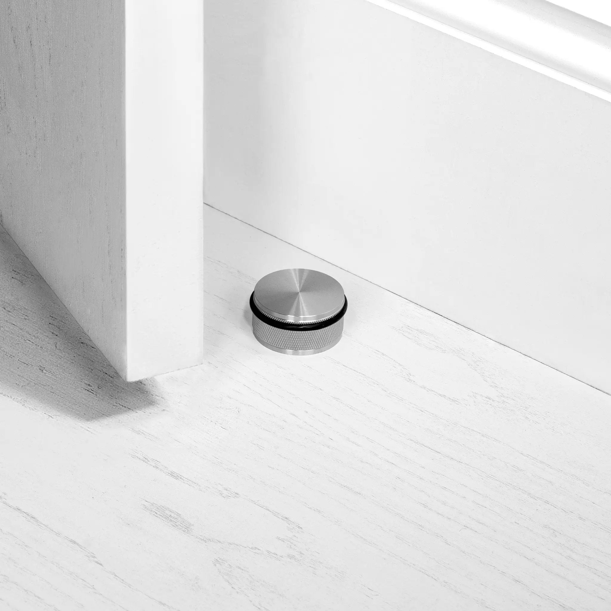 Buster + Punch Floor Door Stop by Buster + Punch