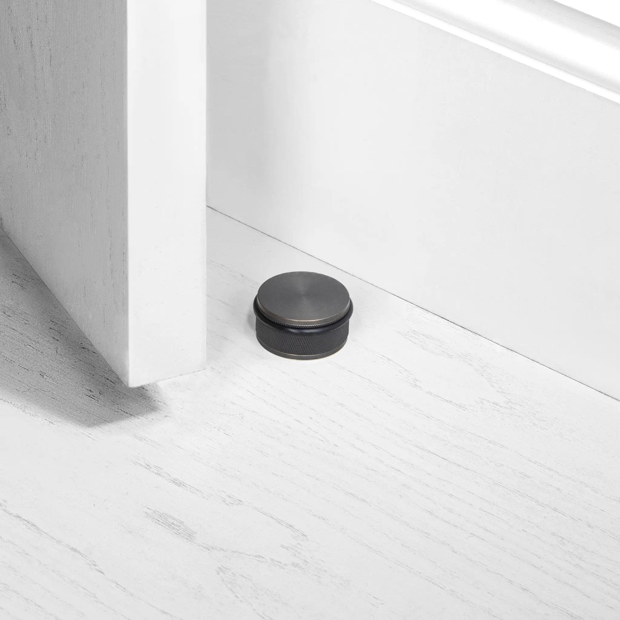 Buster + Punch Floor Door Stop by Buster + Punch