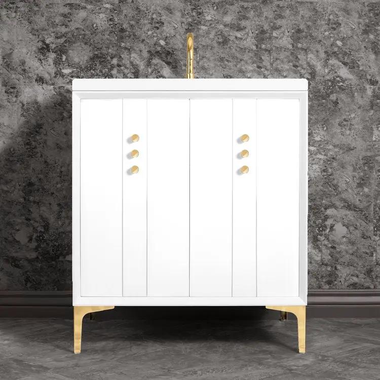 white with polished brass vanity