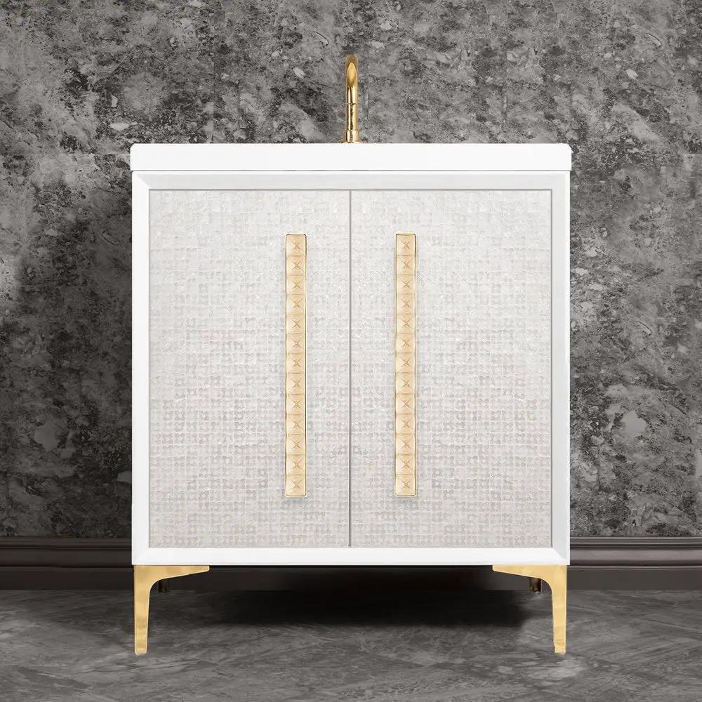 polished brass with eglomisé pyramid glass vanity