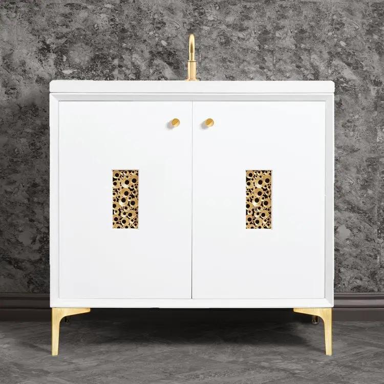 white with satin brass vanity