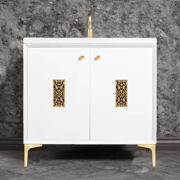 white with satin brass vanity