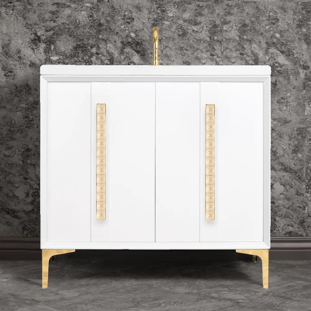polished brass with eglomisé pyramid glass vanity