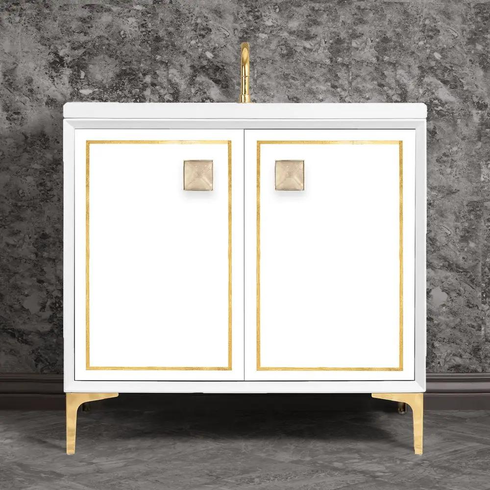 polished brass with eglomisé prism glass vanity
