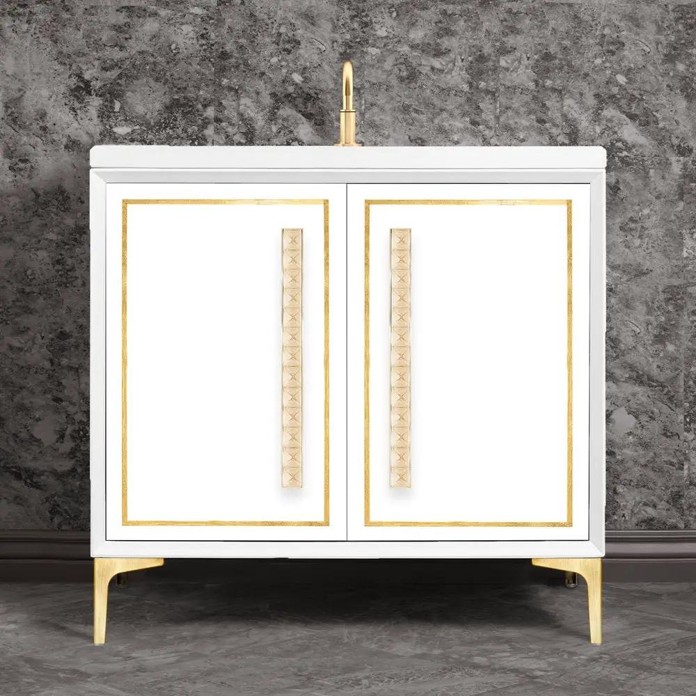 satin brass with eglomisé pyramid glass vanity