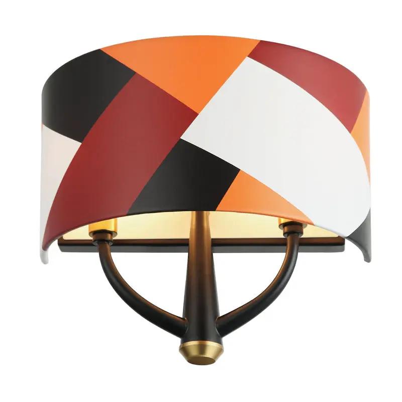 black/satin brass/patchwork wall mount light