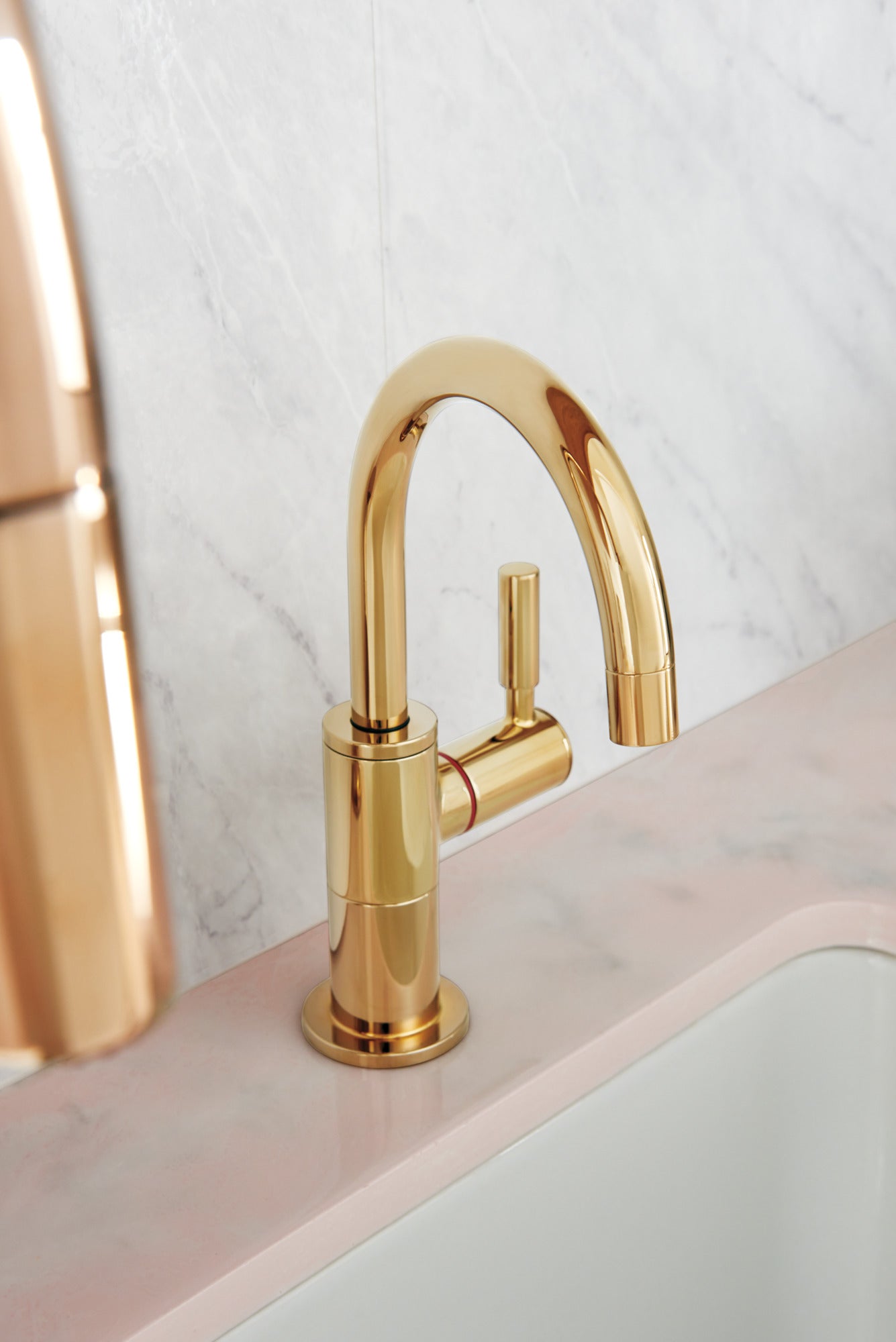 polished gold hot faucet