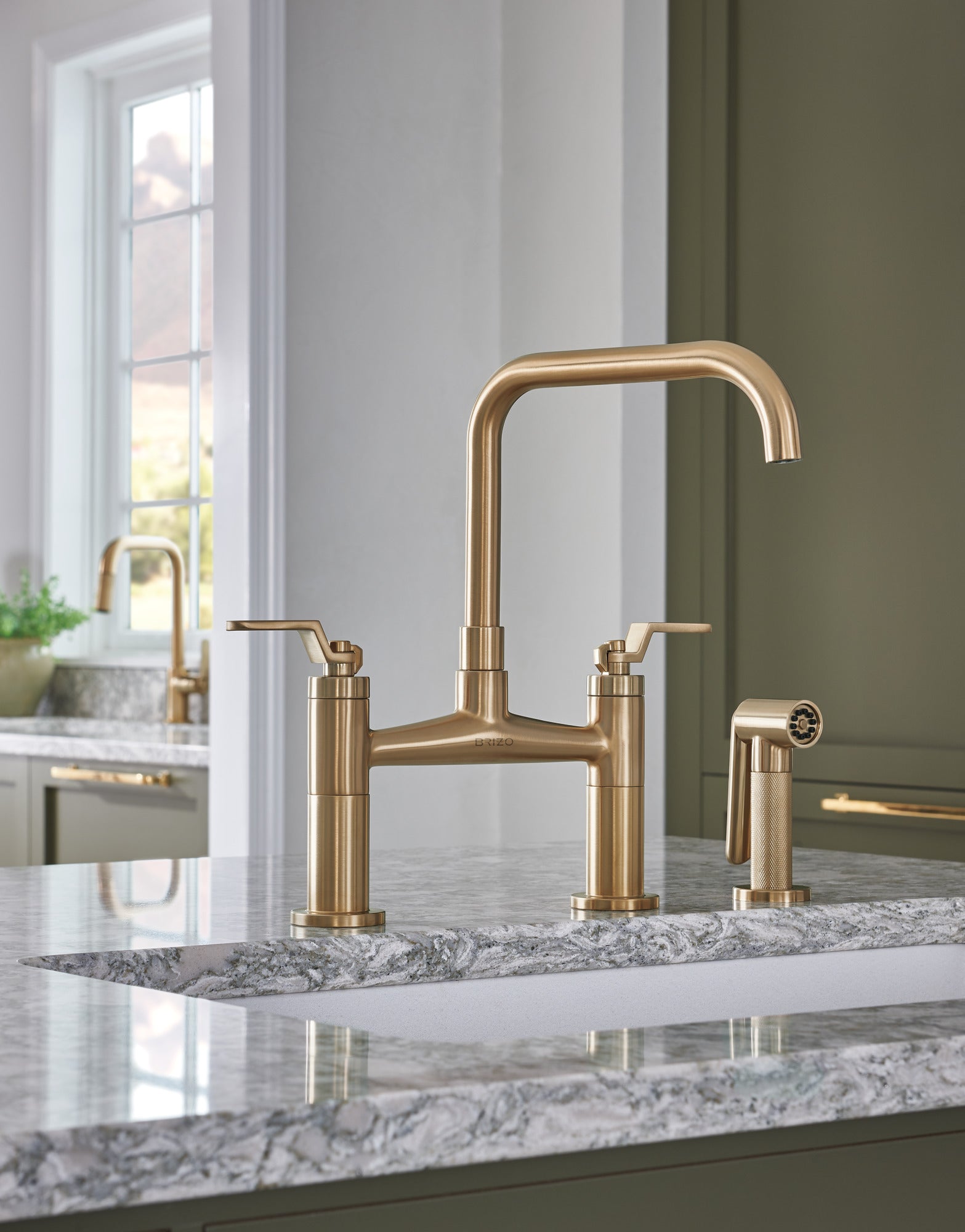 luxe gold bridge faucet