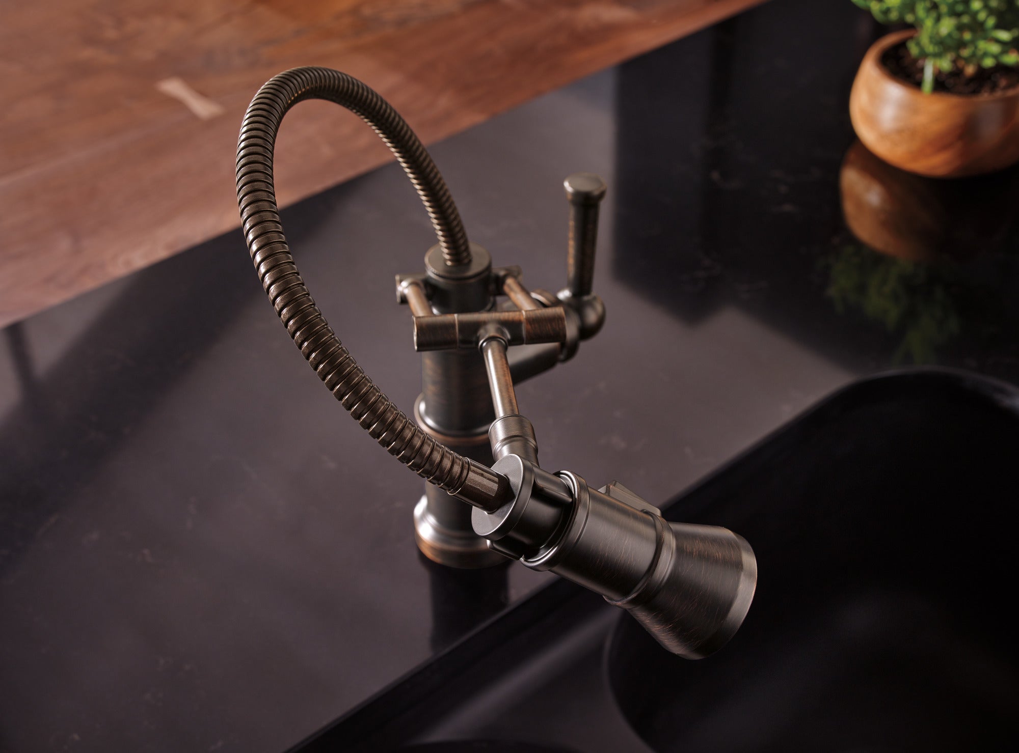 venetian bronze articulating faucet