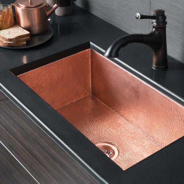 polished copper sink