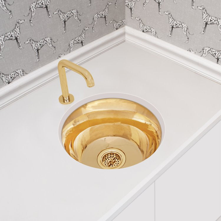 polished unlacquered brass sink