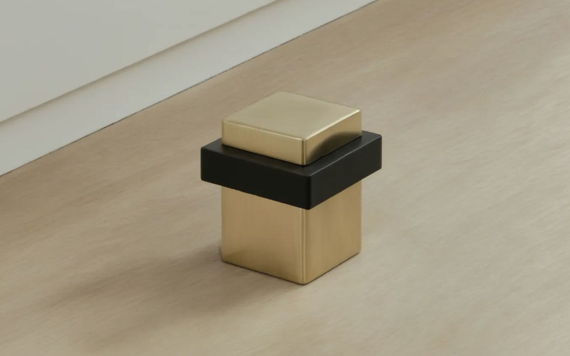 polished brass floor bumper