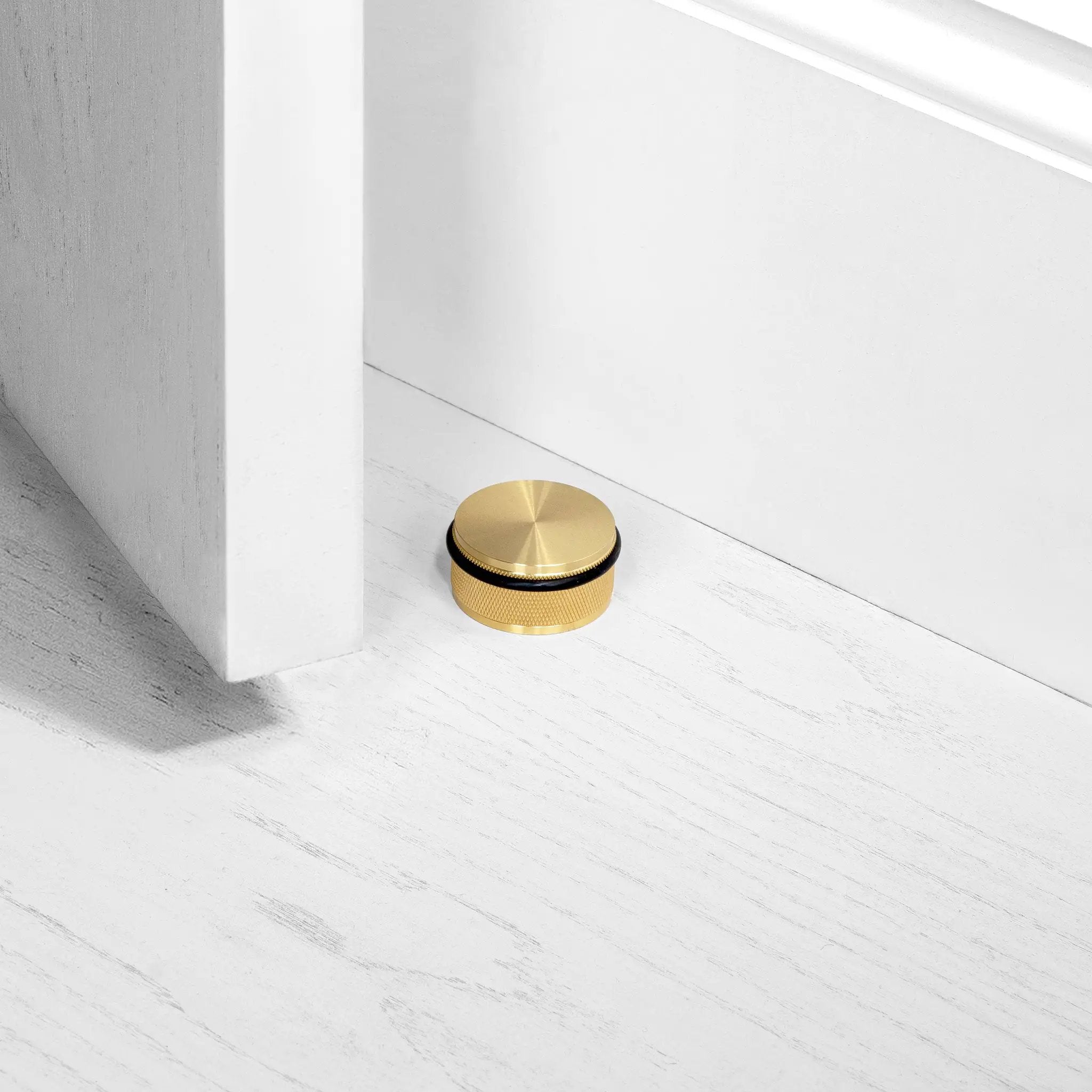 Buster + Punch Floor Door Stop by Buster + Punch